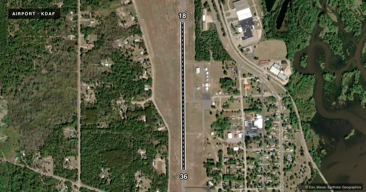 Top-down satellite sketch of KDAF NECEDAH in NECEDAH, WISCONSIN, showing runways 18/36 drawn to scale over Esri World Imagery
