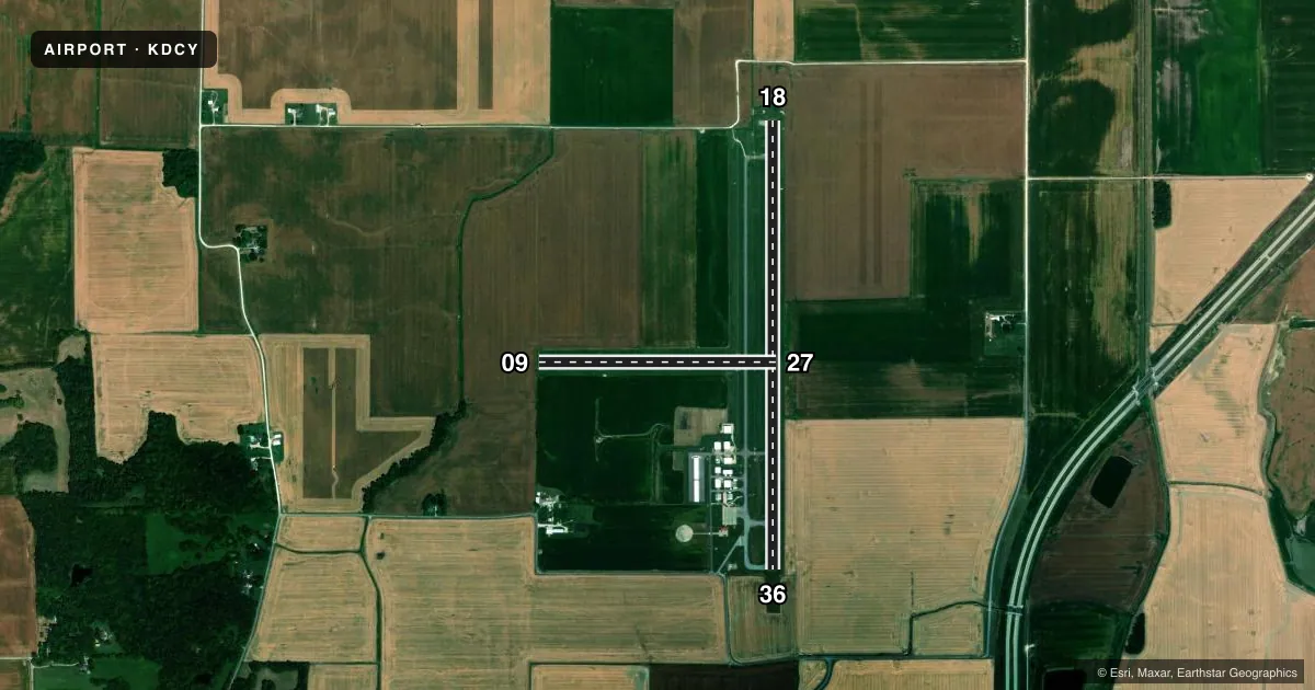 Top-down satellite sketch of KDCY DAVIESS COUNTY in WASHINGTON, INDIANA, showing runways 18/36, 09/27 drawn to scale over Esri World Imagery