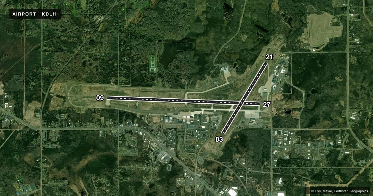 Top-down satellite sketch of KDLH DULUTH INTL in DULUTH, MINNESOTA, showing runways 09/27, 03/21 drawn to scale over Esri World Imagery
