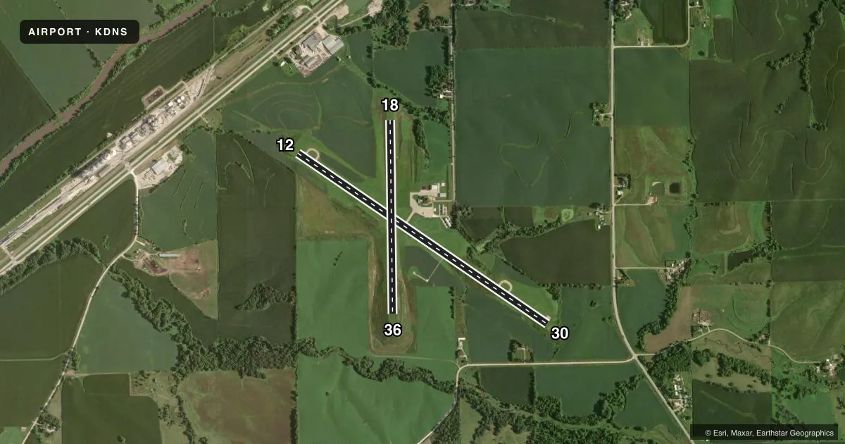 Top-down satellite sketch of KDNS DENISON MUNI in DENISON, IOWA, showing runways 12/30, 18/36 drawn to scale over Esri World Imagery