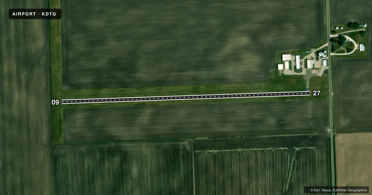 Top-down satellite sketch of KDTG DWIGHT in DWIGHT, ILLINOIS, showing runways 09/27 drawn to scale over Esri World Imagery