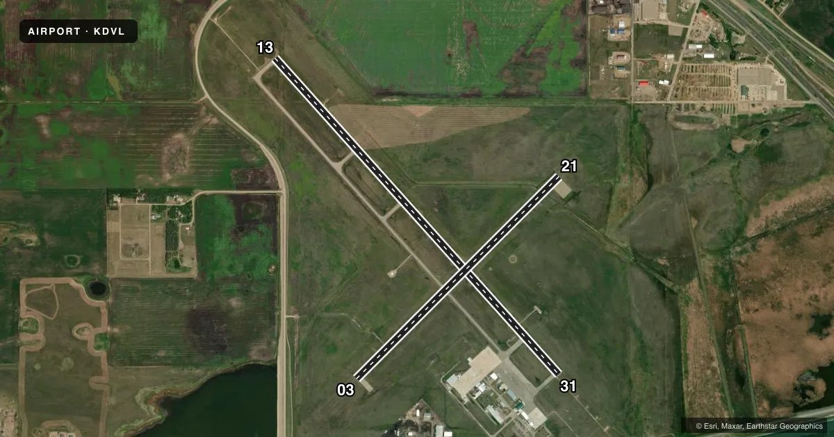 Top-down satellite sketch of KDVL DEVILS LAKE RGNL in DEVILS LAKE, NORTH DAKOTA, showing runways 13/31, 03/21 drawn to scale over Esri World Imagery