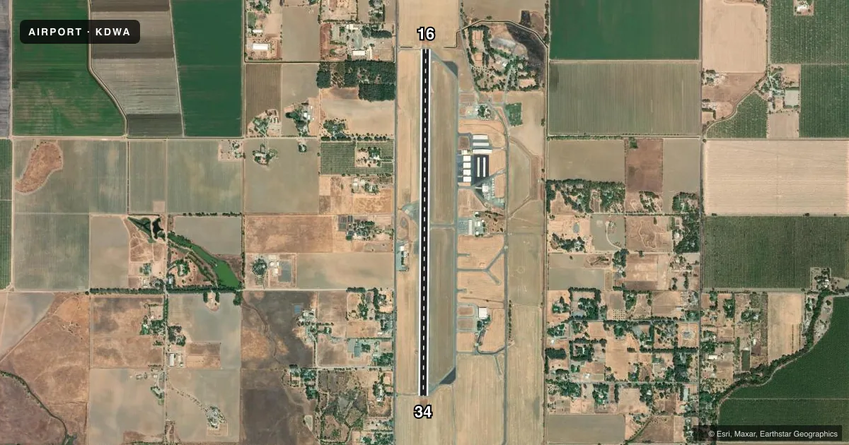 Top-down satellite sketch of KDWA YOLO COUNTY in DAVIS/WOODLAND/WINTERS, CALIFORNIA, showing runways 16/34 drawn to scale over Esri World Imagery
