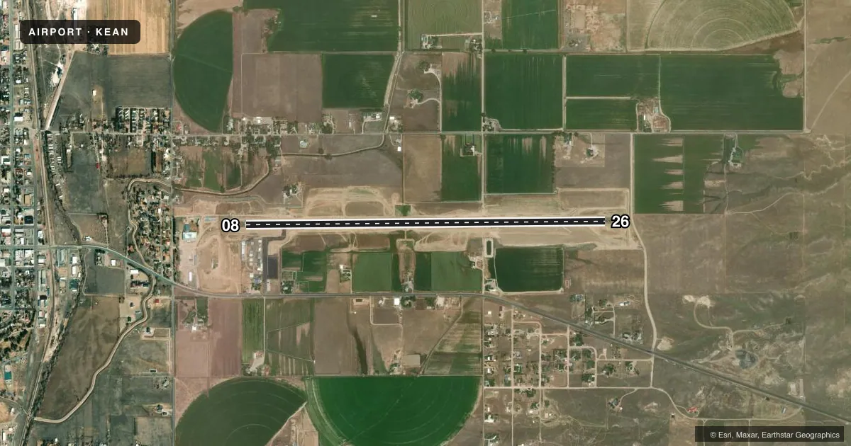 Top-down satellite sketch of KEAN PHIFER AIRFIELD in WHEATLAND, WYOMING, showing runways 08/26 drawn to scale over Esri World Imagery