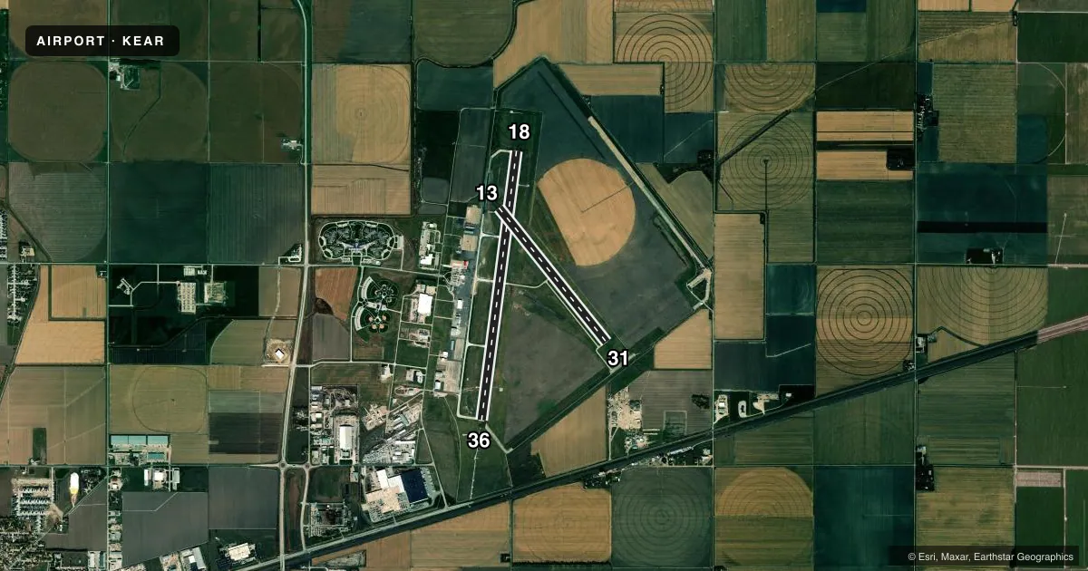 Top-down satellite sketch of KEAR KEARNEY RGNL in KEARNEY, NEBRASKA, showing runways 18/36, 13/31 drawn to scale over Esri World Imagery