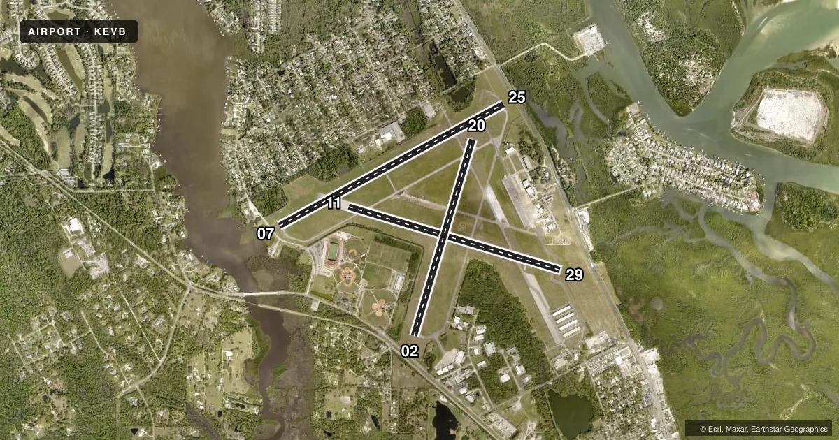 Top-down satellite sketch of KEVB NEW SMYRNA BEACH MUNI (JACK BOLT FLD) in NEW SMYRNA BEACH, FLORIDA, showing runways 07/25, 11/29, 02/20 drawn to scale over Esri World Imagery