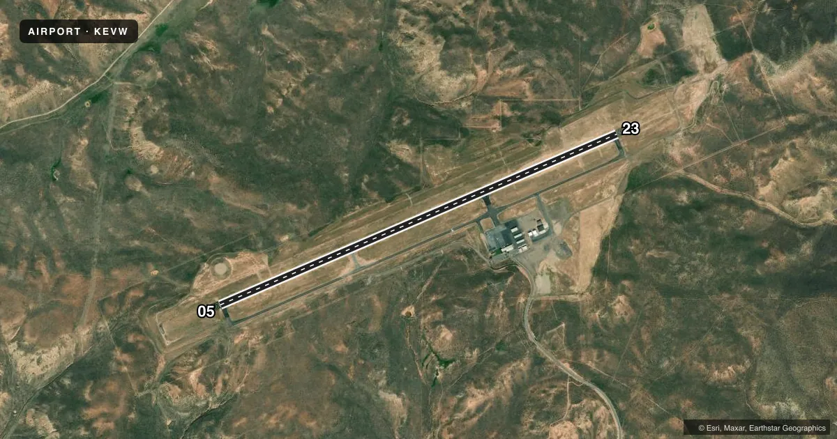Top-down satellite sketch of KEVW EVANSTON-UINTA COUNTY BURNS FLD in EVANSTON, WYOMING, showing runways 05/23 drawn to scale over Esri World Imagery