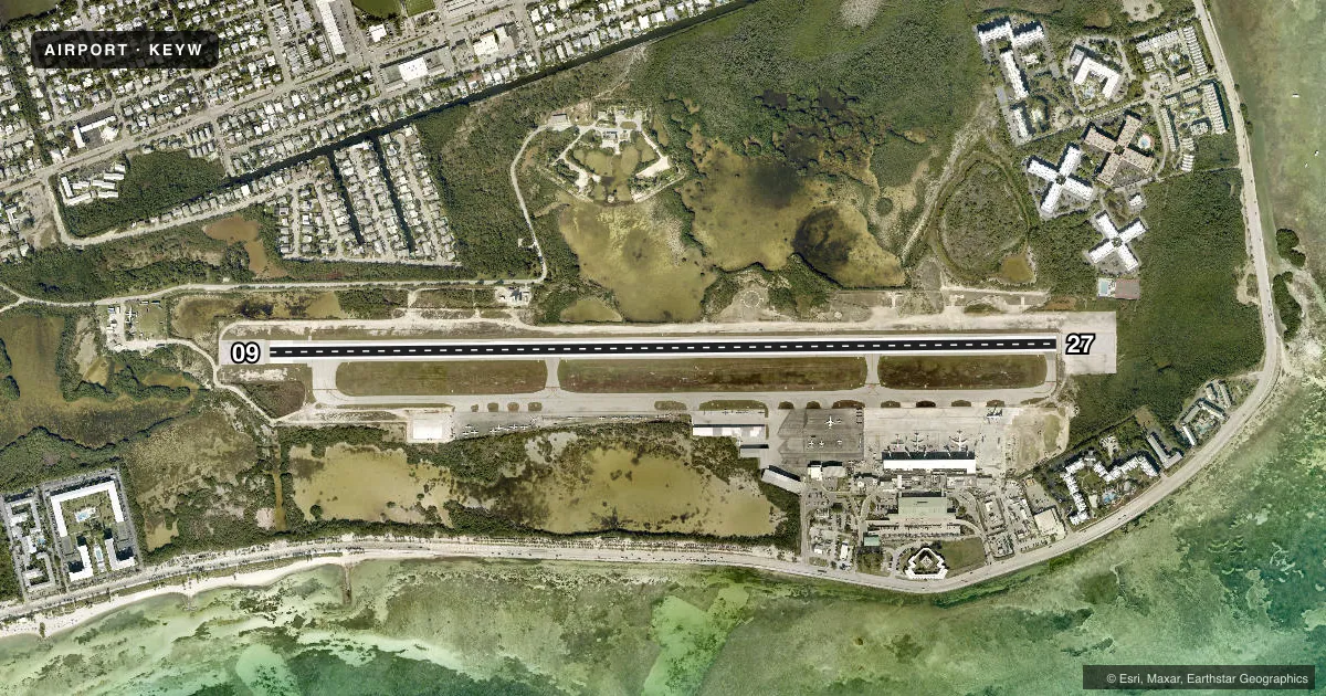 Top-down satellite sketch of KEYW KEY WEST INTL in KEY WEST, FLORIDA, showing runways 09/27 drawn to scale over Esri World Imagery