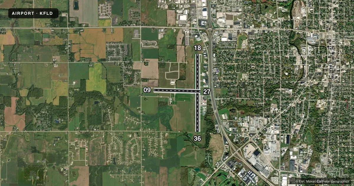 Top-down satellite sketch of KFLD FOND DU LAC COUNTY in FOND DU LAC, WISCONSIN, showing runways 18/36, 09/27 drawn to scale over Esri World Imagery
