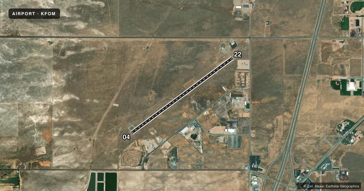 Top-down satellite sketch of KFOM FILLMORE MUNI in FILLMORE, UTAH, showing runways 04/22 drawn to scale over Esri World Imagery