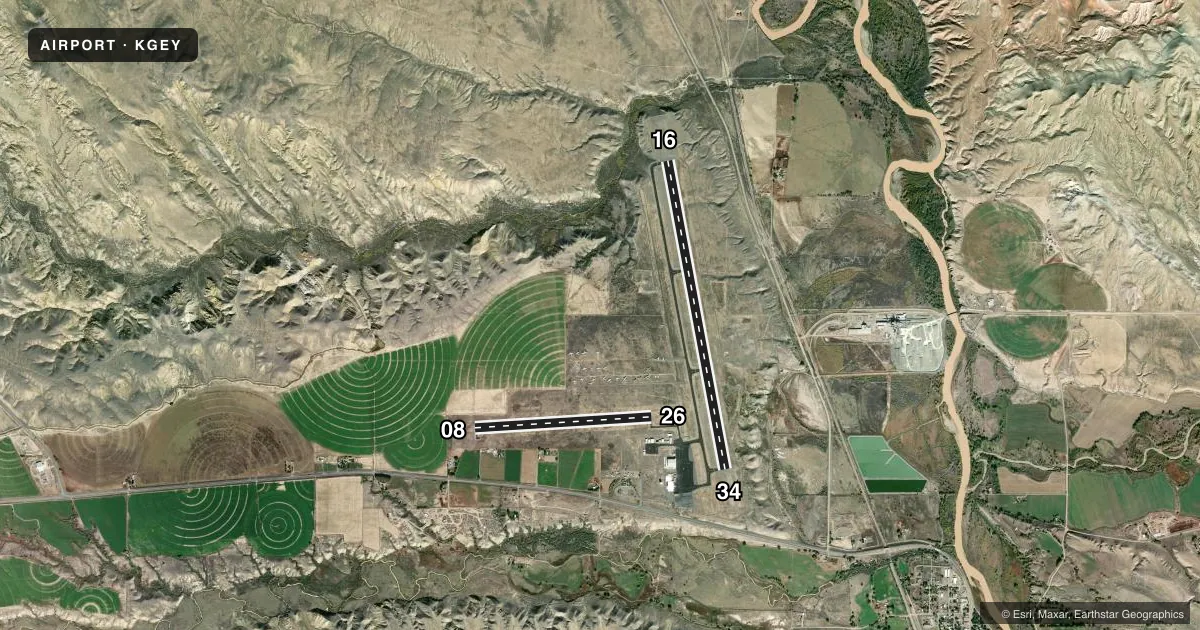 Top-down satellite sketch of KGEY SOUTH BIG HORN COUNTY in GREYBULL, WYOMING, showing runways 16/34, 08/26 drawn to scale over Esri World Imagery
