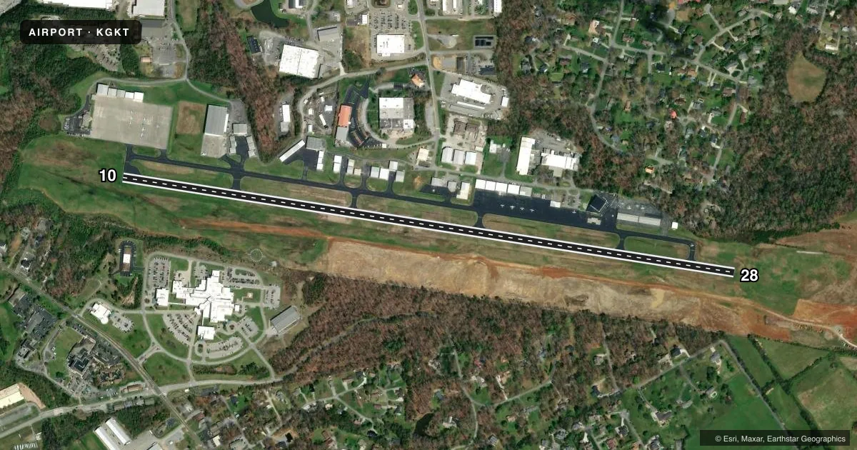 Top-down satellite sketch of KGKT GATLINBURG-PIGEON FORGE in SEVIERVILLE, TENNESSEE, showing runways 10/28 drawn to scale over Esri World Imagery