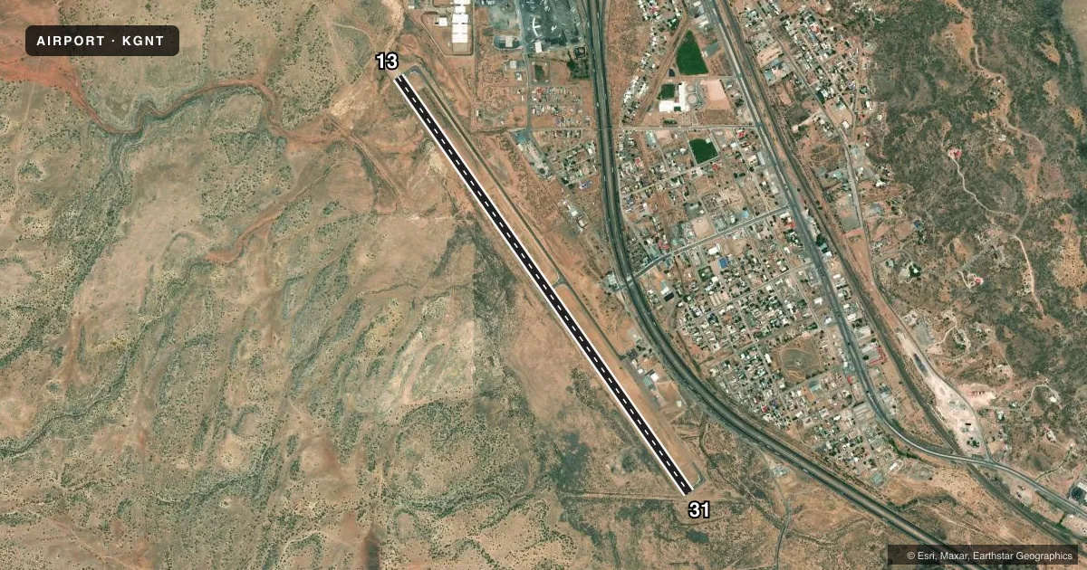 Top-down satellite sketch of KGNT GRANTS-MILAN MUNI in GRANTS, NEW MEXICO, showing runways 13/31 drawn to scale over Esri World Imagery