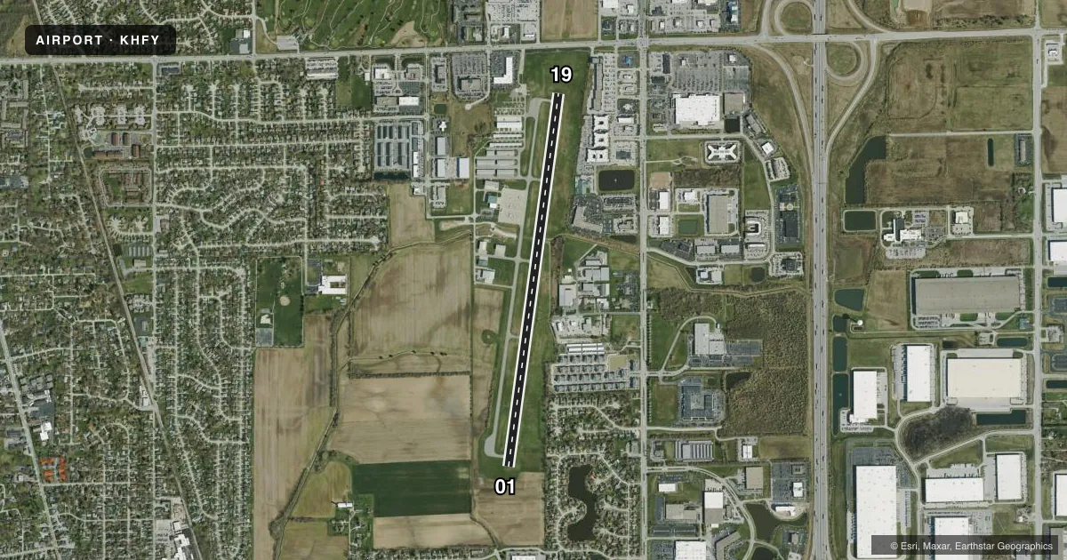 Top-down satellite sketch of KHFY INDY SOUTH GREENWOOD in INDIANAPOLIS, INDIANA, showing runways 01/19 drawn to scale over Esri World Imagery