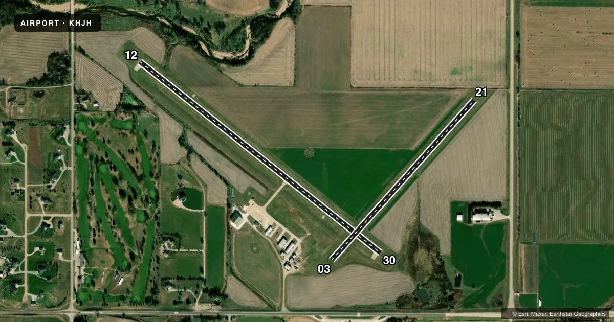Top-down satellite sketch of KHJH HEBRON MUNI in HEBRON, NEBRASKA, showing runways 12/30, 03/21 drawn to scale over Esri World Imagery
