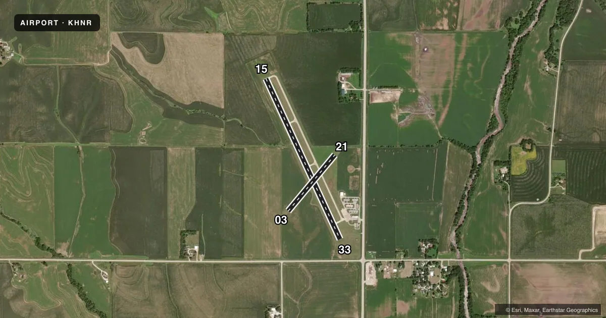 Top-down satellite sketch of KHNR HARLAN MUNI in HARLAN, IOWA, showing runways 15/33, 03/21 drawn to scale over Esri World Imagery