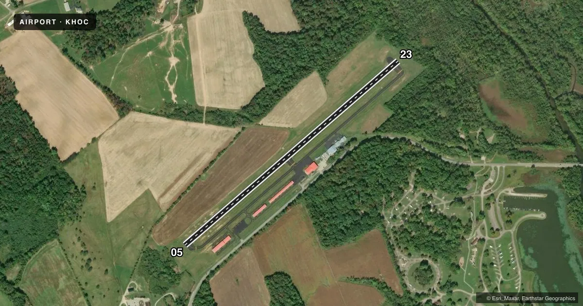 Top-down satellite sketch of KHOC HIGHLAND COUNTY in HILLSBORO, OHIO, showing runways 05/23 drawn to scale over Esri World Imagery