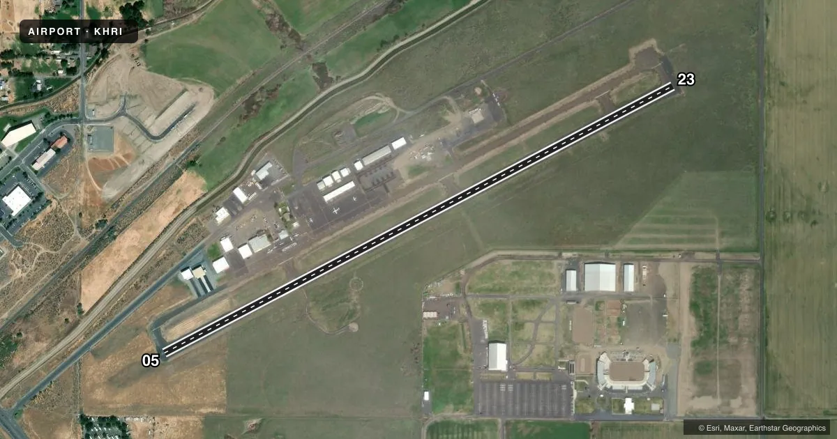 Top-down satellite sketch of KHRI HERMISTON MUNI in HERMISTON, OREGON, showing runways 05/23 drawn to scale over Esri World Imagery