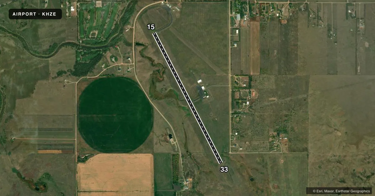 Top-down satellite sketch of KHZE MERCER COUNTY RGNL in HAZEN, NORTH DAKOTA, showing runways 15/33 drawn to scale over Esri World Imagery