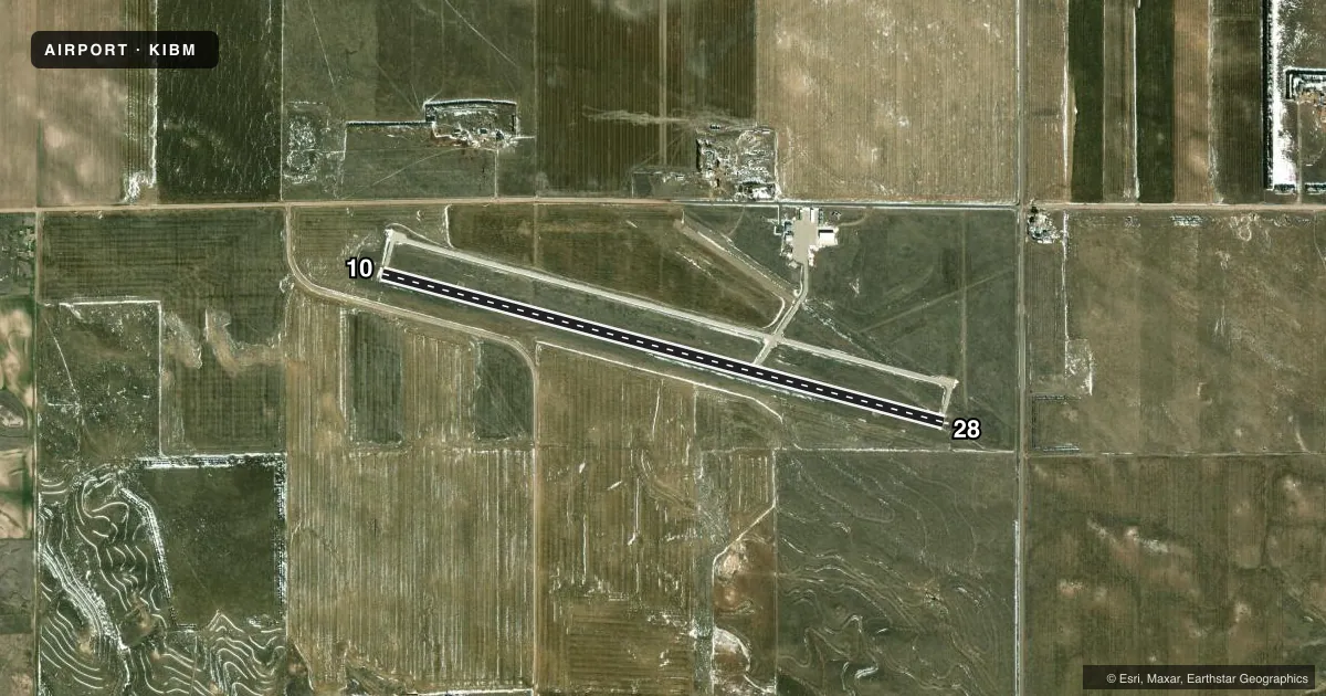 Top-down satellite sketch of KIBM KIMBALL MUNI/ROBERT E ARRAJ FLD in KIMBALL, NEBRASKA, showing runways 10/28 drawn to scale over Esri World Imagery