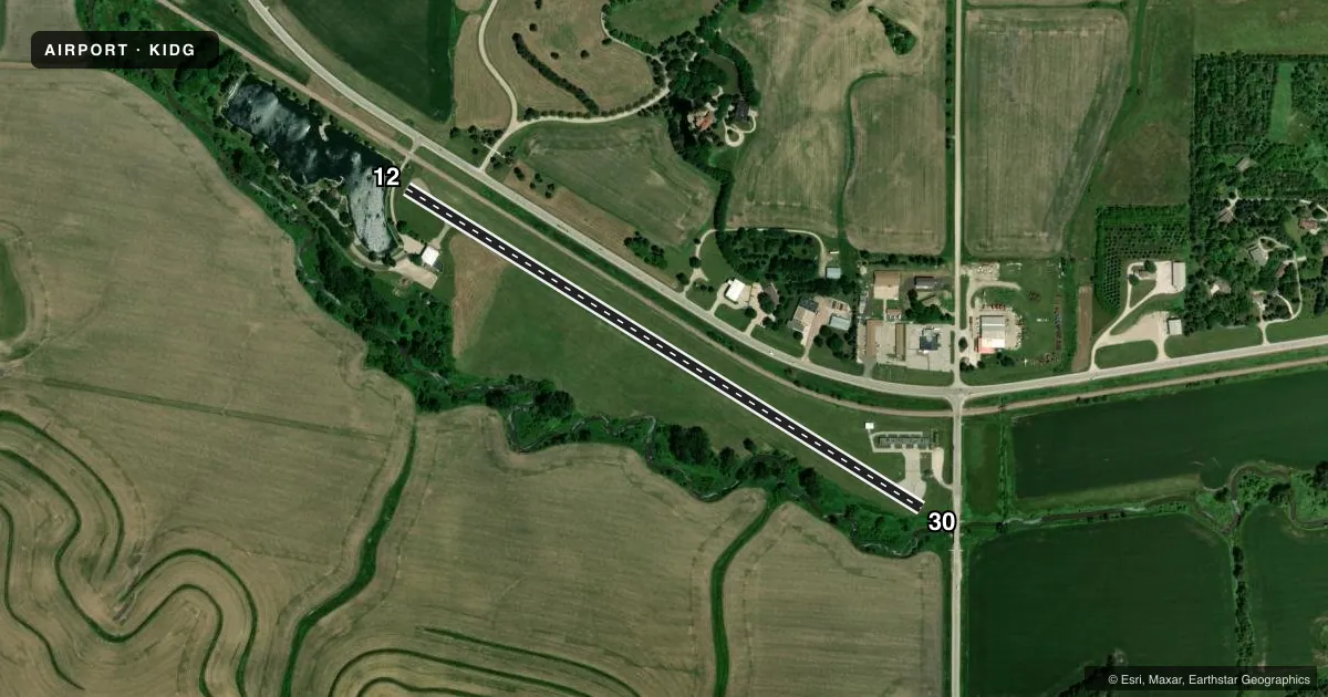 Top-down satellite sketch of KIDG IDA GROVE MUNI in IDA GROVE, IOWA, showing runways 12/30 drawn to scale over Esri World Imagery