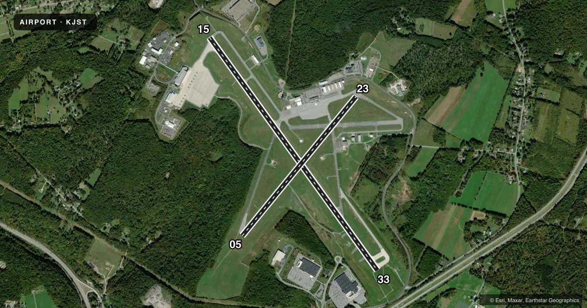 Top-down satellite sketch of KJST JOHN MURTHA JOHNSTOWN/CAMBRIA COUNTY in JOHNSTOWN, PENNSYLVANIA, showing runways 15/33, 05/23 drawn to scale over Esri World Imagery
