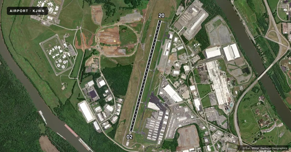 Top-down satellite sketch of KJWN JOHN C TUNE in NASHVILLE, TENNESSEE, showing runways 02/20 drawn to scale over Esri World Imagery