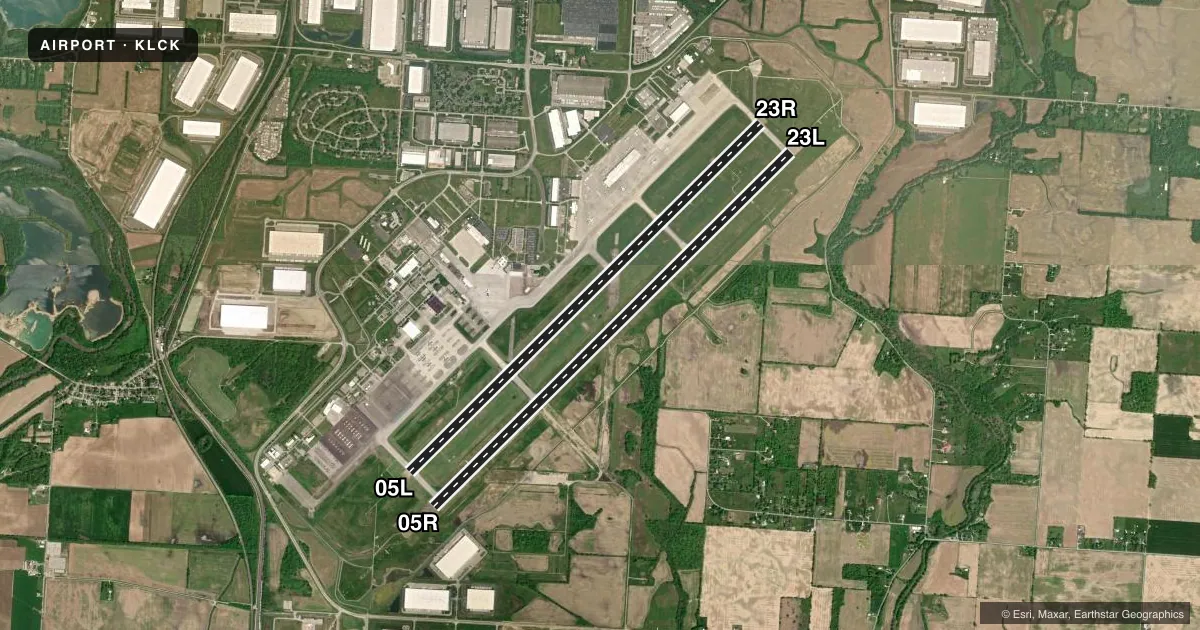 Top-down satellite sketch of KLCK RICKENBACKER INTL in COLUMBUS, OHIO, showing runways 05R/23L, 05L/23R drawn to scale over Esri World Imagery