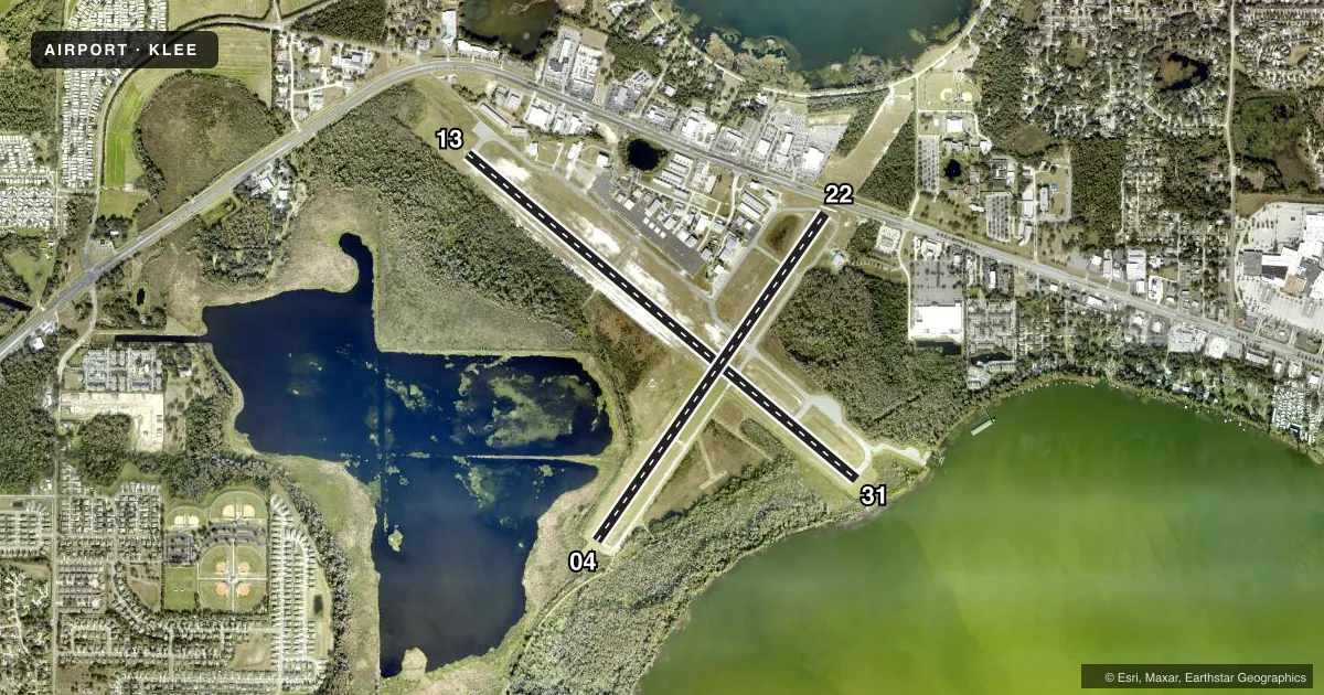 Top-down satellite sketch of KLEE LEESBURG INTL in LEESBURG, FLORIDA, showing runways 13/31, 04/22 drawn to scale over Esri World Imagery