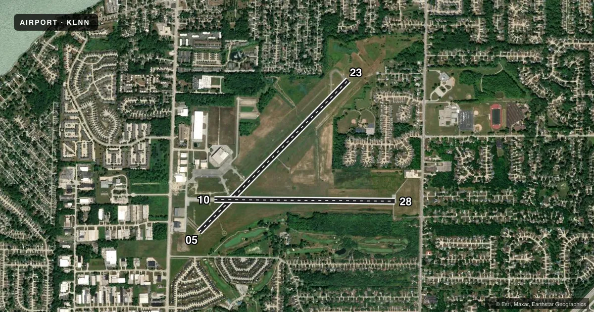 Top-down satellite sketch of KLNN LAKE COUNTY EXEC in WILLOUGHBY, OHIO, showing runways 05/23, 10/28 drawn to scale over Esri World Imagery