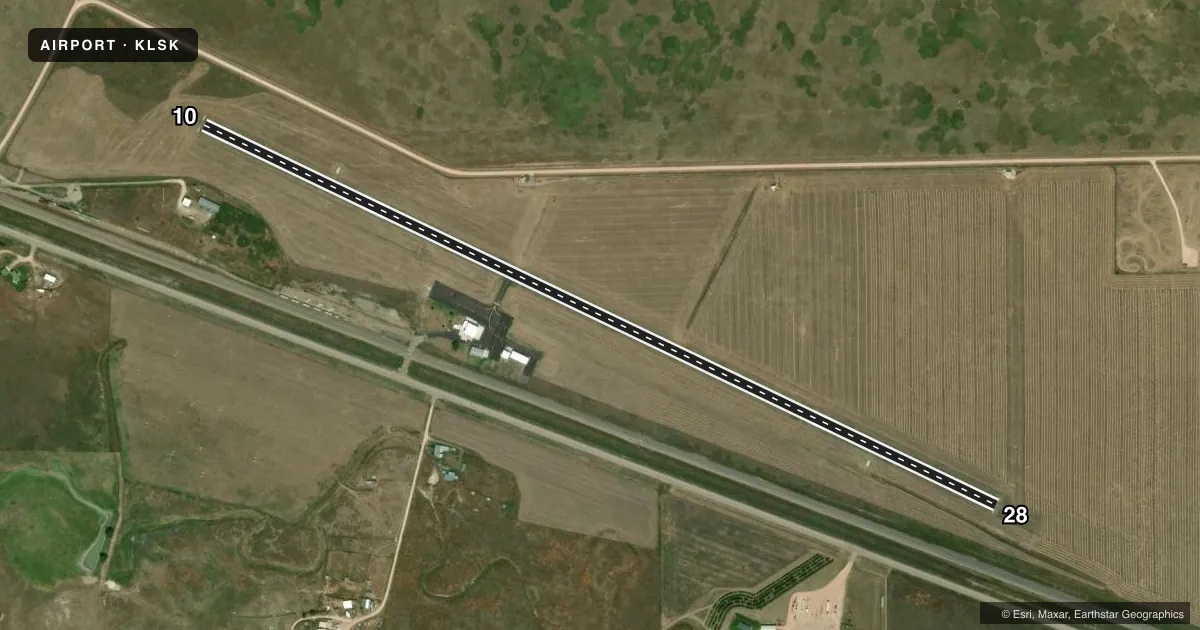 Top-down satellite sketch of KLSK LUSK MUNI in LUSK, WYOMING, showing runways 10/28 drawn to scale over Esri World Imagery