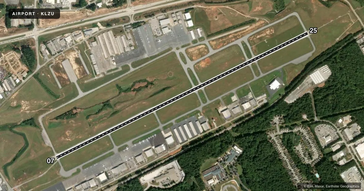 Top-down satellite sketch of KLZU GWINNETT COUNTY/BRISCOE FLD in LAWRENCEVILLE, GEORGIA, showing runways 07/25 drawn to scale over Esri World Imagery