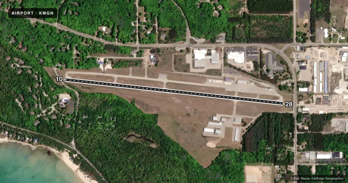 Top-down satellite sketch of KMGN HARBOR SPRINGS in HARBOR SPRINGS, MICHIGAN, showing runways 10/28 drawn to scale over Esri World Imagery