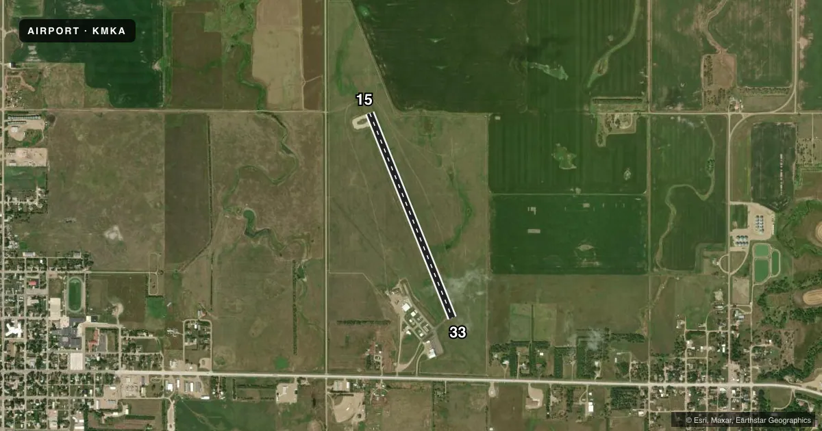Top-down satellite sketch of KMKA MILLER MUNI in MILLER, SOUTH DAKOTA, showing runways 15/33 drawn to scale over Esri World Imagery
