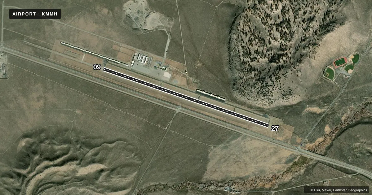 Top-down satellite sketch of KMMH MAMMOTH YOSEMITE in MAMMOTH LAKES, CALIFORNIA, showing runways 09/27 drawn to scale over Esri World Imagery