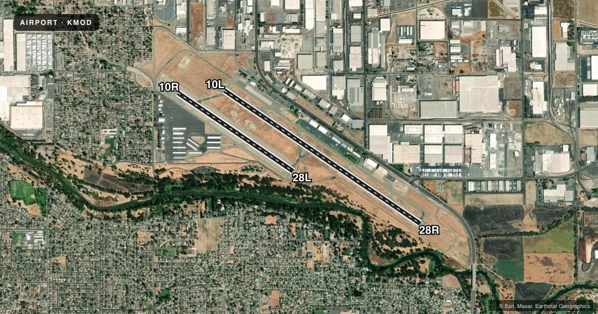 Top-down satellite sketch of KMOD MODESTO CITY-COUNTY-HARRY SHAM FLD in MODESTO, CALIFORNIA, showing runways 10L/28R, 10R/28L drawn to scale over Esri World Imagery