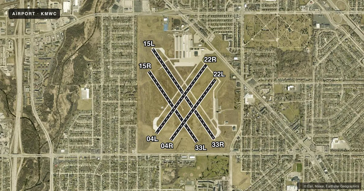 Top-down satellite sketch of KMWC LAWRENCE J TIMMERMAN in MILWAUKEE, WISCONSIN, showing runways 15L/33R, 15R/33L, 04L/22R, 04R/22L drawn to scale over Esri World Imagery