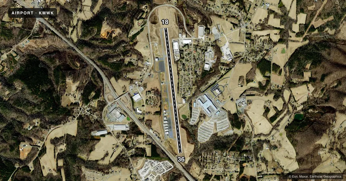 Top-down satellite sketch of KMWK MOUNT AIRY/SURRY COUNTY in MOUNT AIRY, NORTH CAROLINA, showing runways 18/36 drawn to scale over Esri World Imagery