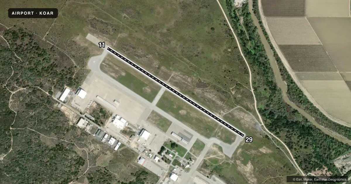 Top-down satellite sketch of KOAR MARINA MUNI in MARINA, CALIFORNIA, showing runways 11/29 drawn to scale over Esri World Imagery