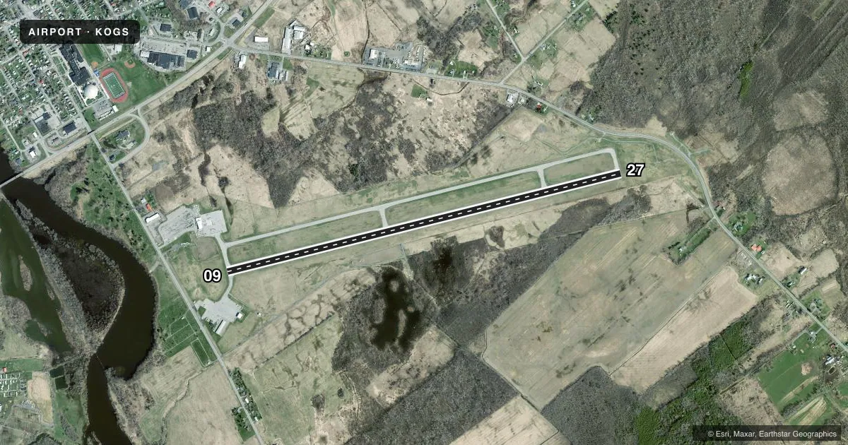 Top-down satellite sketch of KOGS OGDENSBURG INTL in OGDENSBURG, NEW YORK, showing runways 09/27 drawn to scale over Esri World Imagery