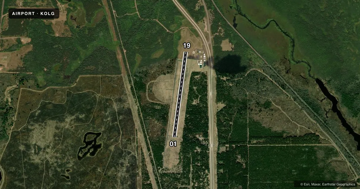 Top-down satellite sketch of KOLG SOLON SPRINGS MUNI in SOLON SPRINGS, WISCONSIN, showing runways 01/19 drawn to scale over Esri World Imagery