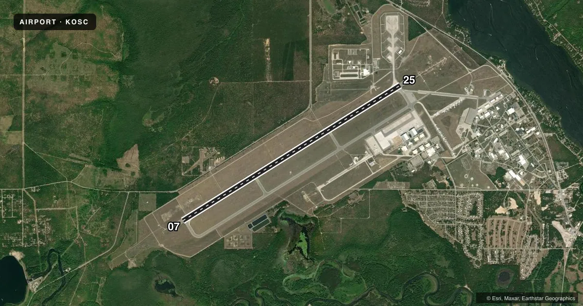 Top-down satellite sketch of KOSC OSCODA/WURTSMITH in OSCODA, MICHIGAN, showing runways 07/25 drawn to scale over Esri World Imagery