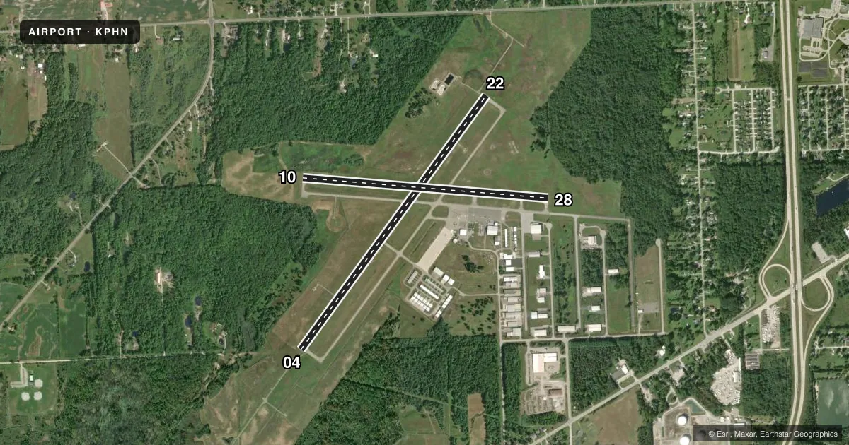 Top-down satellite sketch of KPHN ST CLAIR COUNTY INTL in PORT HURON, MICHIGAN, showing runways 04/22, 10/28 drawn to scale over Esri World Imagery