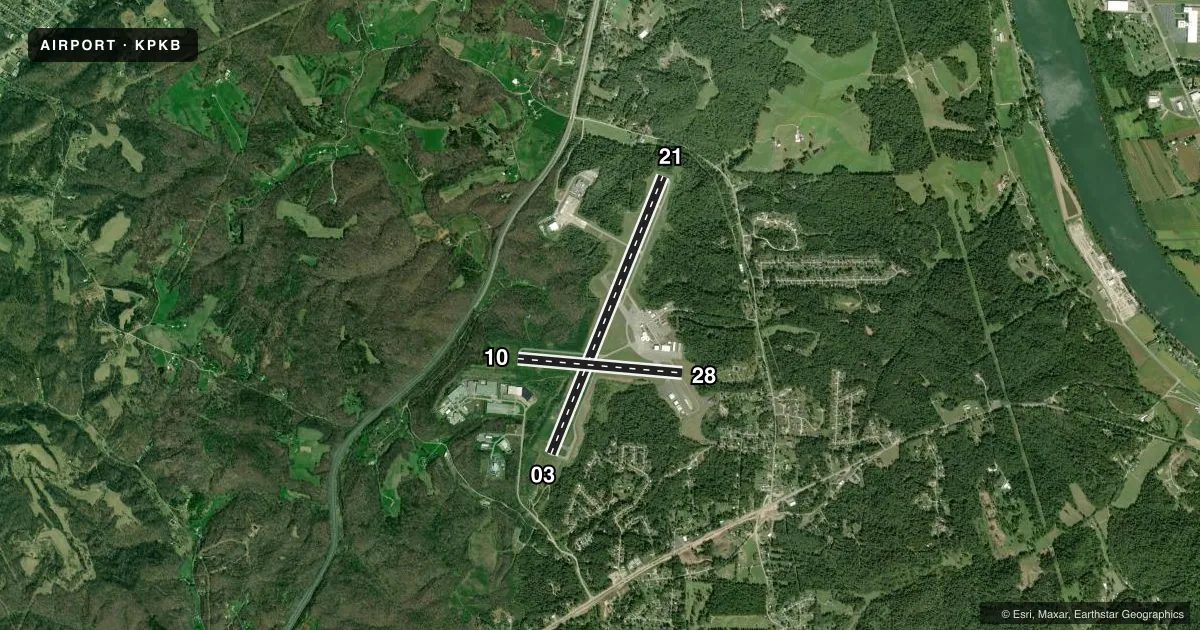Top-down satellite sketch of KPKB MID-OHIO VALLEY RGNL in PARKERSBURG, WEST VIRGINIA, showing runways 03/21, 10/28 drawn to scale over Esri World Imagery