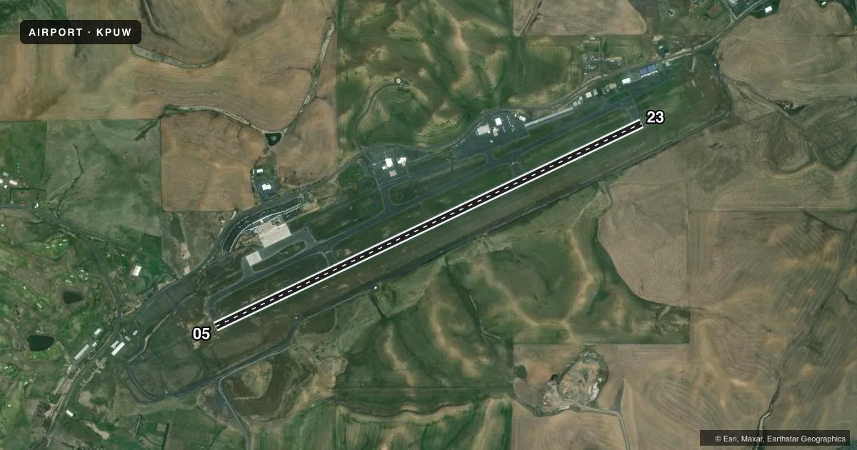 Top-down satellite sketch of KPUW PULLMAN/MOSCOW RGNL in PULLMAN/MOSCOW, WASHINGTON, showing runways 05/23 drawn to scale over Esri World Imagery