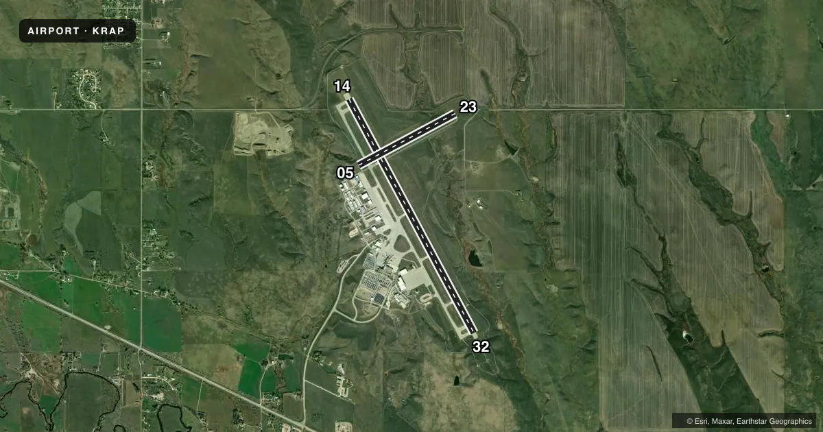 Top-down satellite sketch of KRAP RAPID CITY RGNL in RAPID CITY, SOUTH DAKOTA, showing runways 14/32, 05/23 drawn to scale over Esri World Imagery
