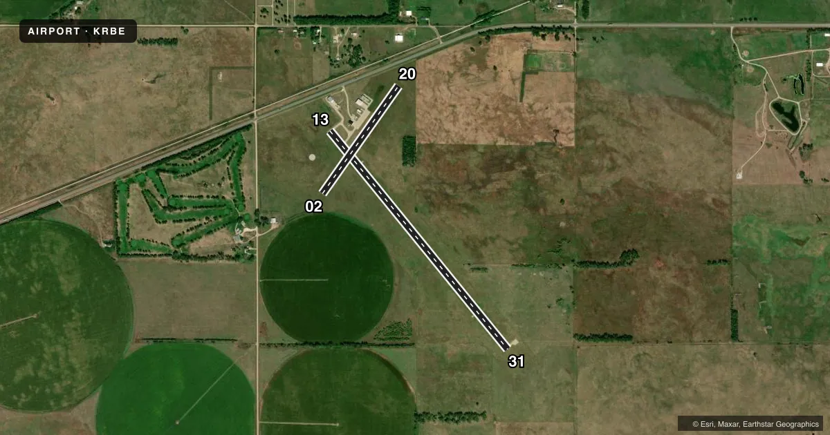 Top-down satellite sketch of KRBE ROCK COUNTY in BASSETT, NEBRASKA, showing runways 13/31, 02/20 drawn to scale over Esri World Imagery