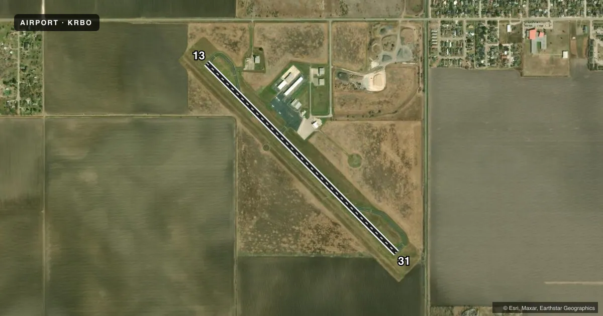 Top-down satellite sketch of KRBO NUECES COUNTY in ROBSTOWN, TEXAS, showing runways 13/31 drawn to scale over Esri World Imagery