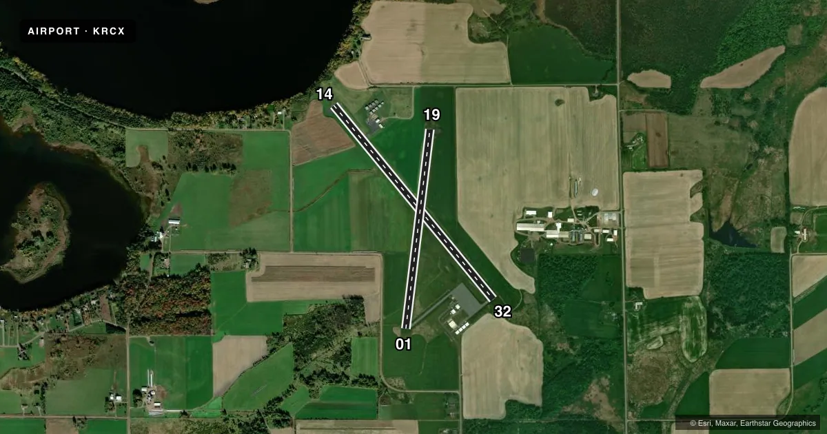 Top-down satellite sketch of KRCX RUSK COUNTY in LADYSMITH, WISCONSIN, showing runways 14/32, 01/19 drawn to scale over Esri World Imagery