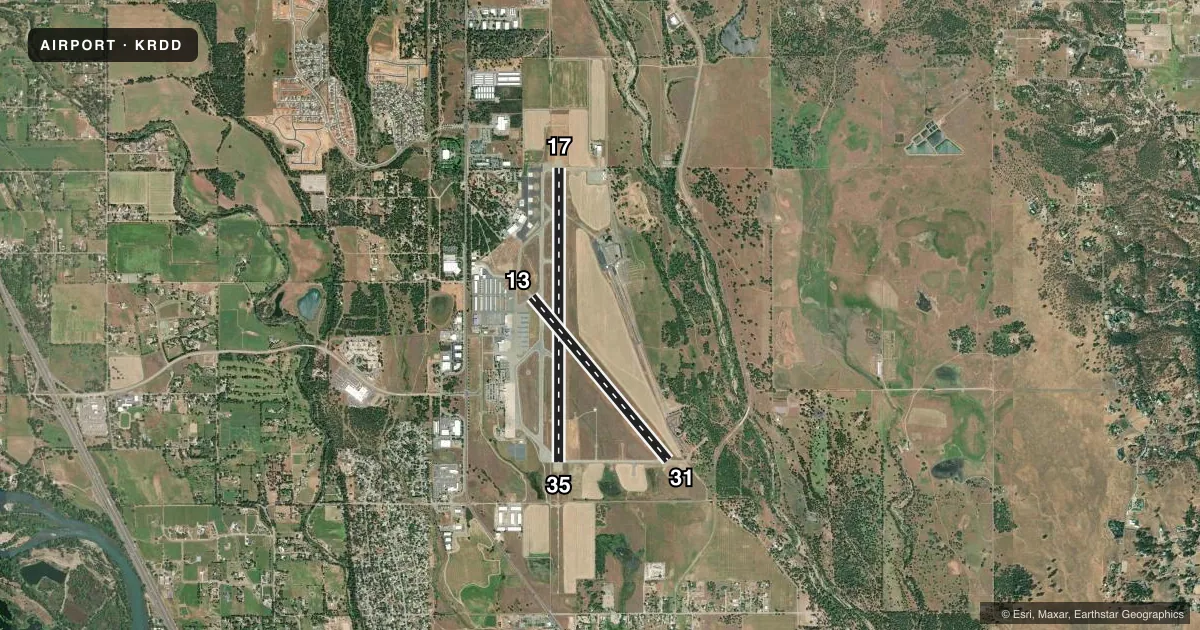 Top-down satellite sketch of KRDD REDDING RGNL in REDDING, CALIFORNIA, showing runways 17/35, 13/31 drawn to scale over Esri World Imagery